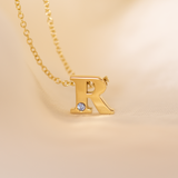 Alphabet necklace 18k gold.