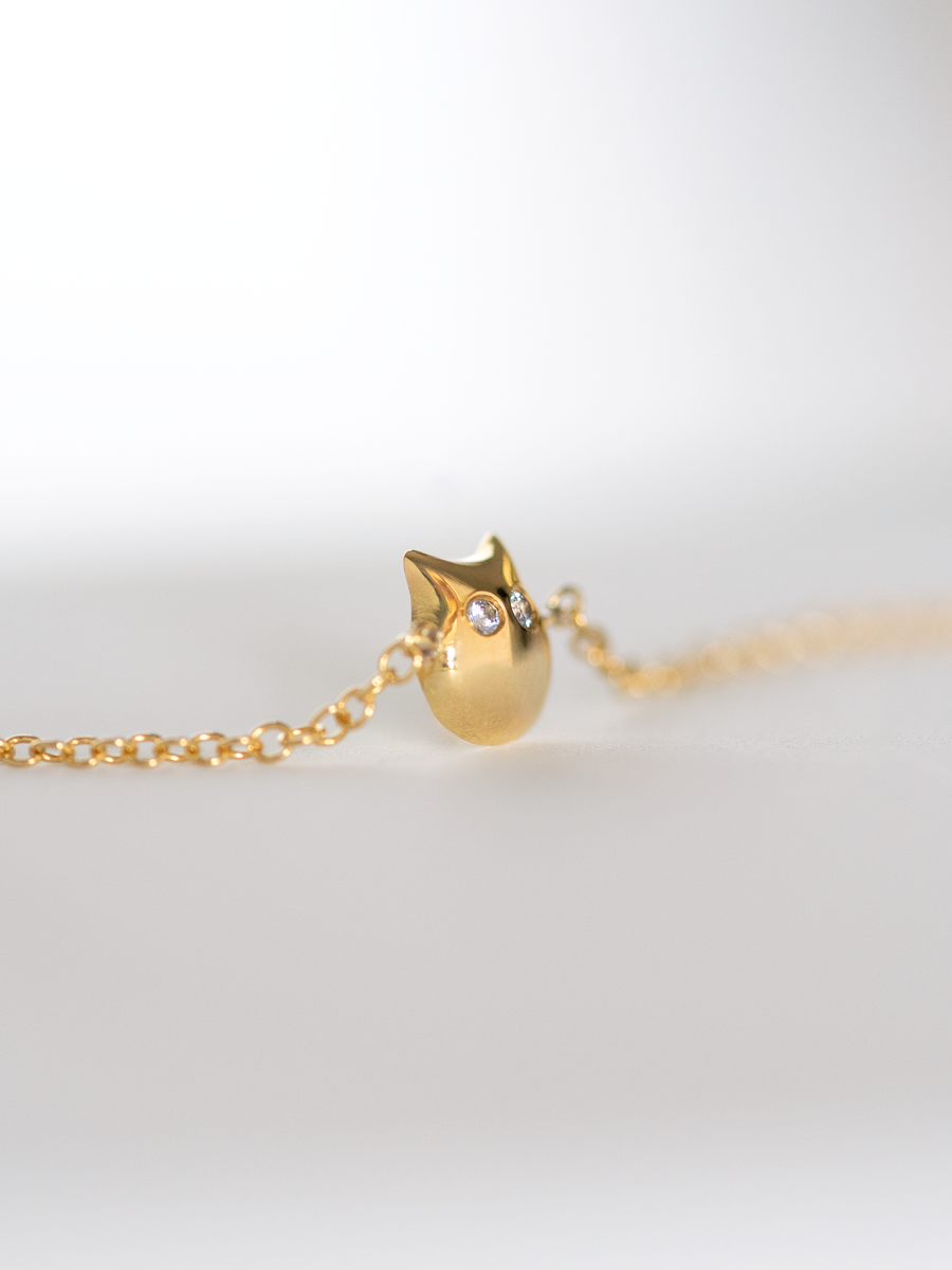 18k gold Cat symbol bracelet