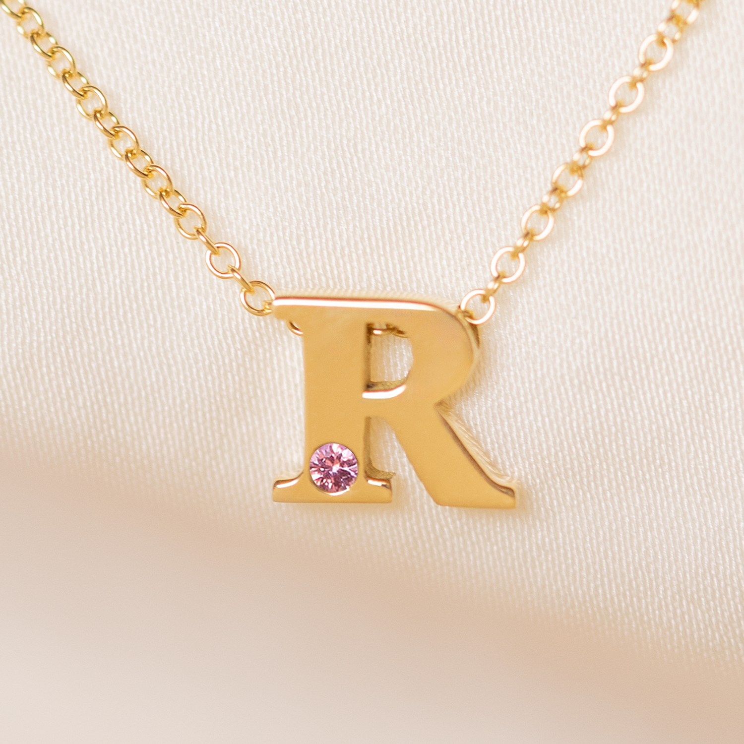 Alphabet necklace 18k gold.