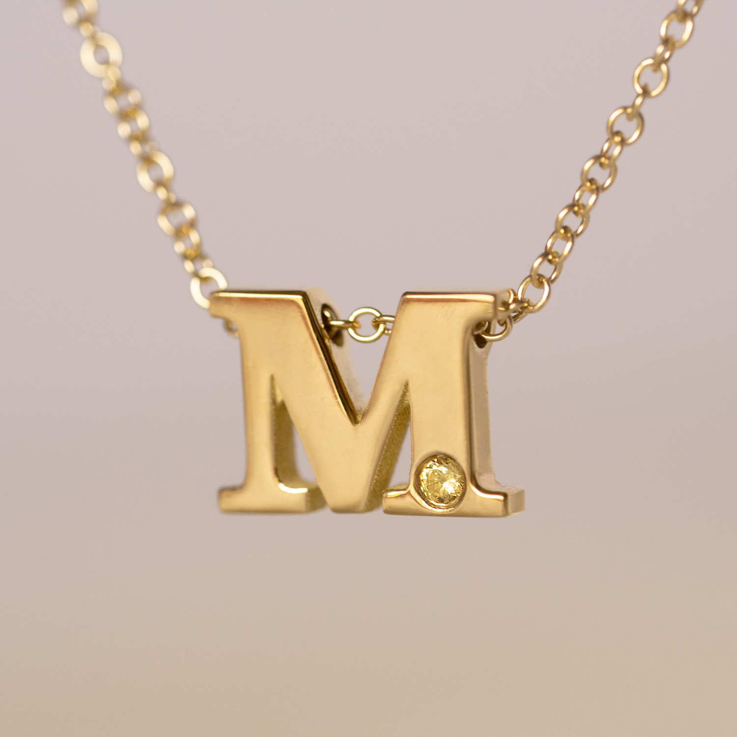 Alphabet necklace 18k gold.