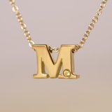 Alphabet necklace 18k gold.