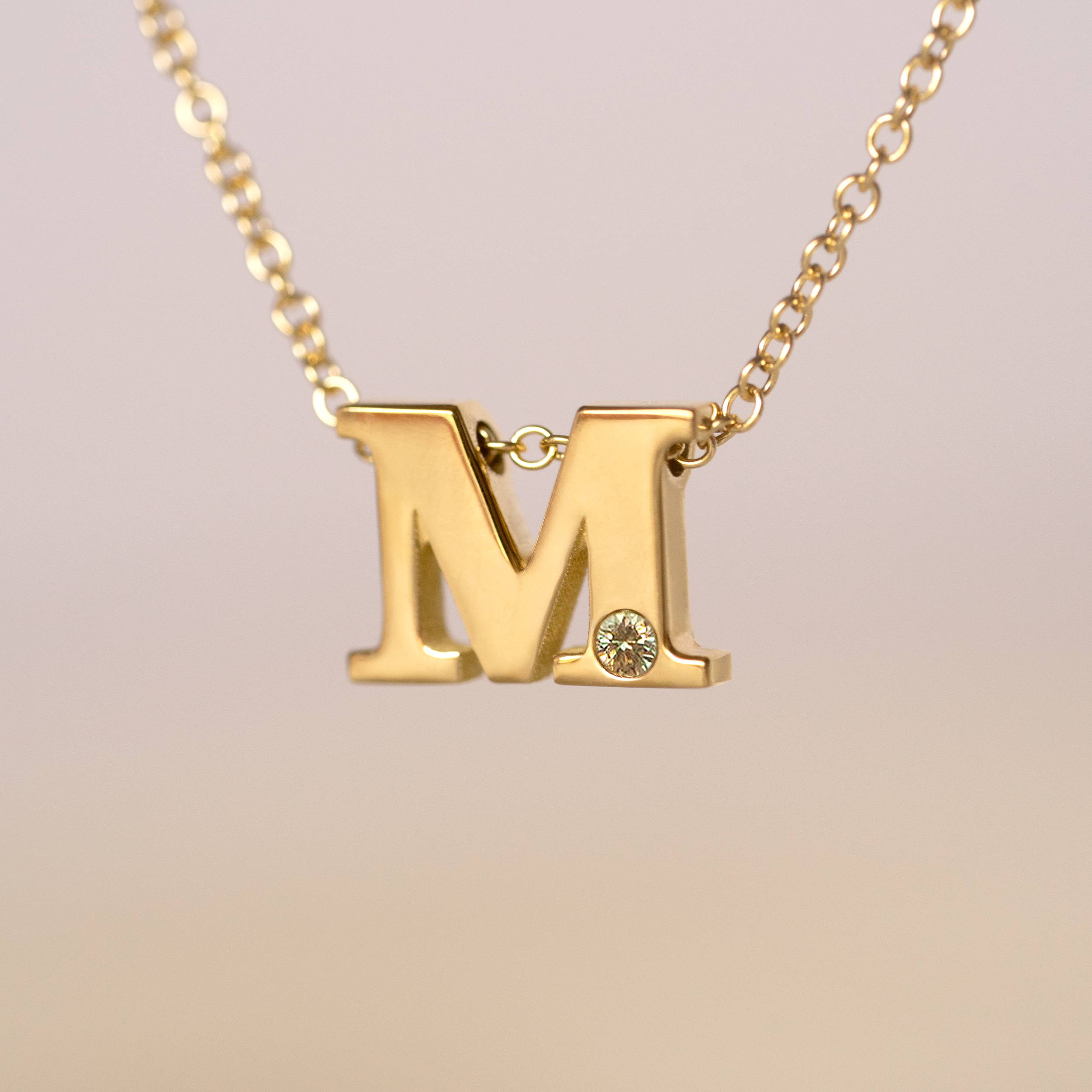 Alphabet necklace 18k gold.