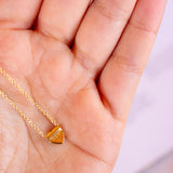18k gold heart necklace.
