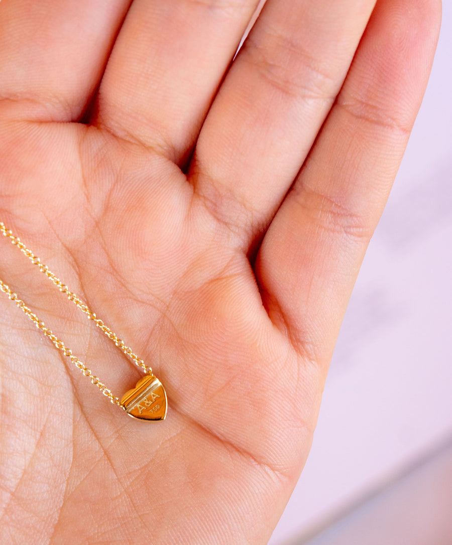 18k gold heart necklace.