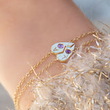 18k gold half heart bracelets set for two.