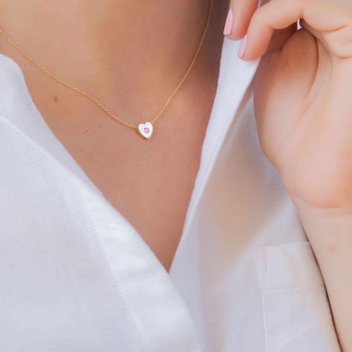 18k gold heart necklace.